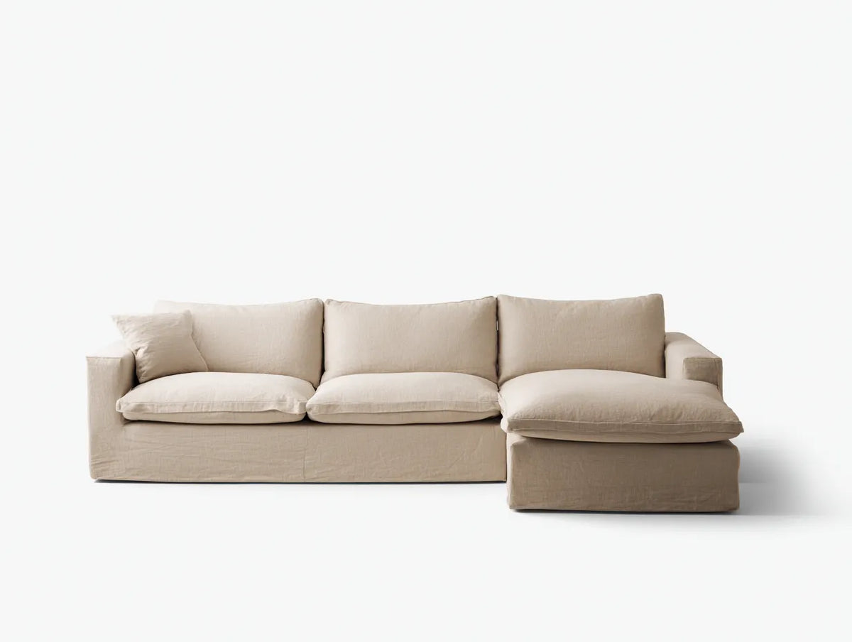 Divano angolare in tessuto 255×162×86 cm - beige chiaro - seduta ampia con chaise longue